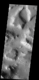 This isolated mesa has an almost heart-shaped margin. Happy Valentine's Day from Mars as seen by NASA's 2001 Mars Odyssey.
