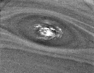 This bulls-eye view of Neptune's small dark spot (D2) was obtained by NASA's Voyager 2's narrow-angle camera. Banding surrounding the feature indicates unseen strong winds.