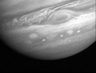 This frame from a movie shows the portion of Jupiter around the Great Red Spot as it swirls through more than 60 Jupiter days. As NASA's Voyager 1 approached Jupiter in 1979, it took images of the planet at regular intervals.