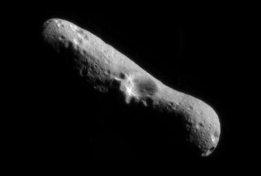 This image of Eros, looking down over the north pole at one of its largest craters, was the first of an asteroid taken from an orbiting spacecraft, obtained by NASA's NEAR Shoemaker on Feb 14, 2000, immediately after the spacecraft's insertion into orbit.