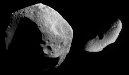 This image from NASA's NEAR Shoemaker shows asteroids Mathilde (left) and Eros (right) at the same scale.