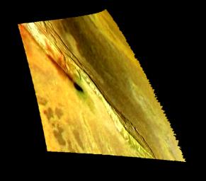 This image from NASA's Galileo spacecraft shows one of many mountains on Jupiter's moon Io. The image was made by combining a recent high-resolution, black and white image with earlier low-resolution color data to provide a high-resolution, color view.
