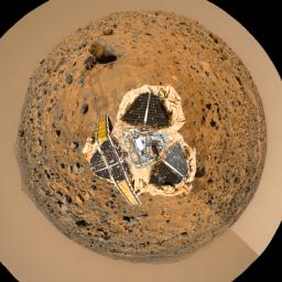 This image from NASA's Mars Pathfinder has been rotated so that the main points of interest, which are the 'Rock Garden,' the rover Sojourner and the rock 'Yogi,' are visible arching across the upper hemisphere.