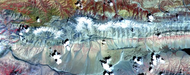 The Kunlun fault is one of the gigantic strike-slip faults that bound the north side of Tibet. NASA's Terra satellite acquired the scene on July 20, 2000.