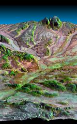 This three-dimensional perspective view, looking up the Tigil River, acquired by NASA's Shuttle Radar Topography Mission from data collected on February 16, 2000, shows the western side of the volcanically active Kamchatka Peninsula, Russia.