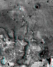 This anaglyph, from NASA's Shuttle Radar Topography Mission, shows Meseta de Somuncura, a broad plateau capped by basalt. Near its western edge is evidence of multiple volcanic events. 3D glasses are necessary to view this image.