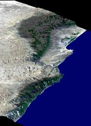 This perspective view from NASA's Shuttle Radar Topography Mission includes the city of Salalah, the second largest city in Oman. The city is located on the broad, generally bright coastal plain and includes areas of green irrigated crops.