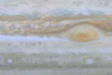 This image is a still frame, created from images taken by NASA's Cassini spacecraft, shows a turbulent region west of Jupiter's Great Red Spot. The small, bright white spots are believed to be thunderstorms.