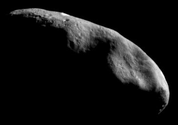 This image of asteroid Eros, taken by NASA's NEAR Shoemaker on Dec. 3, 2000, shows an overview of the eastern part of the asteroid's southern hemisphere. The conspicuous depression just above the center of the frame is the saddle-shaped feature Himeros.