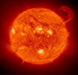 NASA's Extreme Ultraviolet Imaging Telescope aboard ESA's SOHO spacecraft took this image of a huge, handle-shaped prominence in 1999. Prominences are huge clouds of relatively cool dense plasma suspended in the Sun's hot, thin corona.