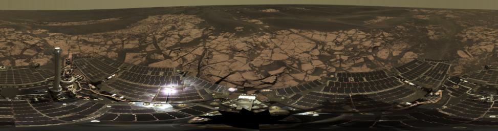 This is the Opportunity panoramic camera's 'Erebus Rim' panorama, acquired on sols 652 to 663 (Nov. 23 to Dec. 5, 2005 ), as NASA's Mars Exploration Rover Opportunity was exploring sand dunes and outcrop rocks in Meridiani Planum.
