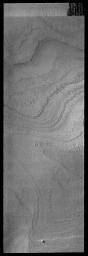 Late in the summer season, the numerous polar layers on Mars are free of frost and easily visible as seen by NASA's 2001 Mars Odyssey spacecraft.