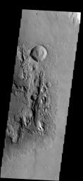 The floor of Millochau Crater on Mars has been filled by material that is now being eroded away as seen by NASA's 2001 Mars Odyssey spacecraft.