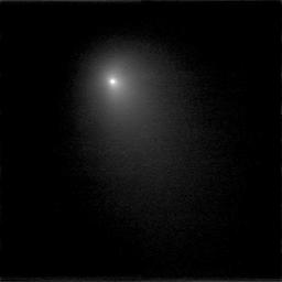 This image of comet Tempel 1 is a compilation of nine images that were taken on June 15, 2005 by NASA's Deep Impact spacecraft. The comet's coma shines brightly.
