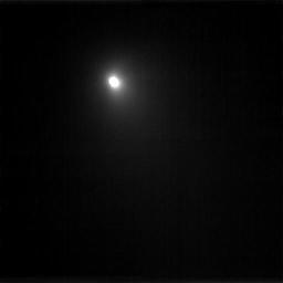 This image of comet Tempel 1 is a compilation of nine images that were taken on June 15, 2005 by NASA's Deep Impact spacecraft. The comet's coma can be senn.
