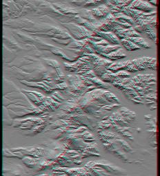 This anaglyph, from NASA's Shuttle Radar Topography Mission, shows the Kamchatka Peninsula in eastern Russia. Sredinnyy Khrebet, the mountain range that makes up the spine of the peninsula. 3D glasses are necessary to view this image.