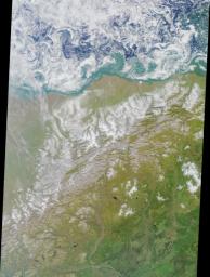 This colorful image of the Arctic National Wildlife Refuge and the Beaufort Sea was acquired by the NASA's Terra satellite on August 16, 2000, during Terra orbit 3532.