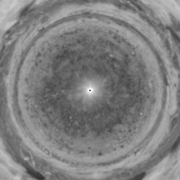 Bands of eastward and westward winds on Jupiter appear as concentric rotating circles in this frame from a movie composed of NASA Cassini spacecraft images that have been re-projected as if the viewer were looking down at Jupiter's north pole.
