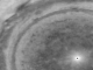 Persistent polar storms and zonal winds on Jupiter can be seen in this magnified quadrant from a movie projecting images from NASA's Cassini spacecraft as if the viewer were looking down at Jupiter's north pole and the planet were flattened.