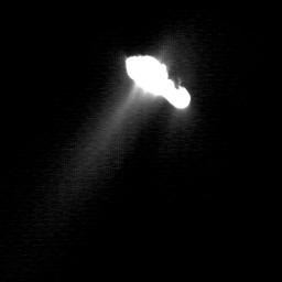 This image, taken by NASA's Deep Space 1 on September 22, 2001, has been enhanced to reveal dust being ejected from the nucleus of comet Borrelly. As a result, the nucleus is bright white in the image.