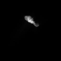 Sunlight illuminates the bowling-pin shaped nucleus from directly below comet Borrelly as seen by NASA's Deep Space 1. At this distance, many features become vivid on the surface of the nucleus, including a jagged line between day and night on the comet.