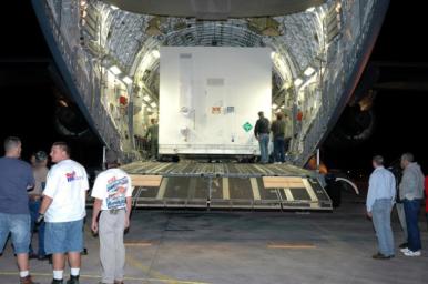 NASA's Mars Reconnaissance Orbiter was delivered in two large containers from Lockheed Martin to Cape Canaveral on an Air Force C-17 cargo plane.