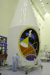 This image features the protective fairing that encapsulated NASA's Mars Reconnaissance Orbiter atop an Atlas V rocket. The lively logo celebrates the intense science mission ahead of the orbiter.