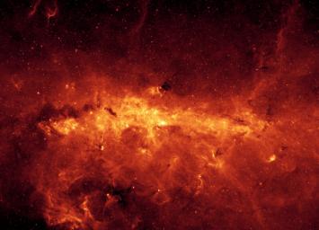 Our Milky Way is a dusty place. So dusty that we cannot see the center of the galaxy in visible light. Thanks to NASA's Spitzer Space Telescope's excellent resolution, the dusty features within the galactic center are seen in unprecedented detail.