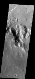 This fan-shaped delta deposit is located in Holden Crater on Mars as seen by NASA's 2001 Mars Odyssey spacecraft.