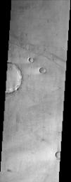 Bosporus Planum, seen in this image from NASA's Mars Odyssey spacecraft, is located in a region of smooth plains that appear to have formed from lava flows. 