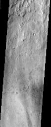 This NASA Mars Odyssey image shows a close-up view of the ridged plains in Hesperia Planum, a classic locality for Martian surfaces that formed in the 'middle ages' of the planet's history.