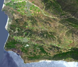 The area around Vandenberg Air Force Base, Calif. is shown in this simulated natural color image captured by NASA's Terra spacecraft .The city of Santa Maria is at the top left, and Lompoc is at the bottom left.
