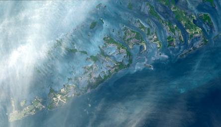 The Florida Keys are a chain of islands, islets and reefs extending from Virginia Key to the Dry Tortugas. This image was acquired by NASA's Terra satellite on October 28, 2001.
