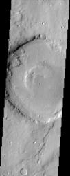 The impact crater in this NASA Mars Odyssey image is a model illustration of the effects of erosion on Mars. The degraded crater rim and several landslides observed in crater walls are evidence of the mass wasting of materials.