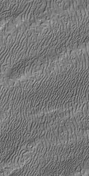 NASA's Mars Global Surveyor shows Mars' south polar residual cap landscape, formed in frozen carbon dioxide.