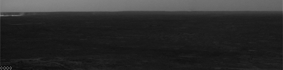 This image shows some distant dust devils and one closer one blowing across the floor of Mars' Gusev Crater. It consists of frames taken by the navigation camera on NASA's Mars Exploration Rover Spirit on July 7, 2005.