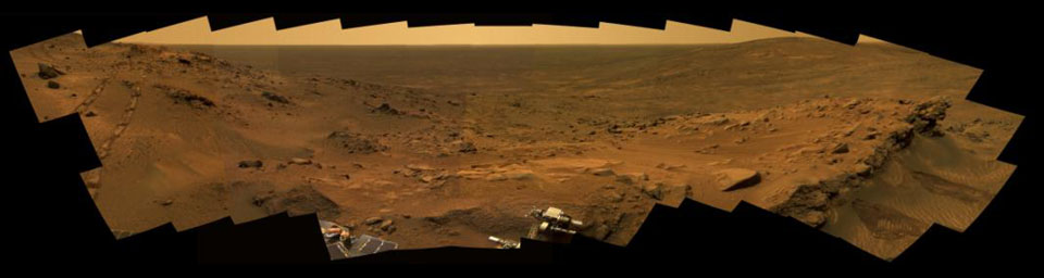 This image from NASA's Mars Exploration Rover Spirit shows Mars' red landscape at 'Whale Panorama' on May 27 through 30, 2005.