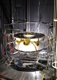 NASA's Rover 1 in the cruise configuration in Jet Propulsion Laboratory's 25-ft Solar Thermal Vacuum Chamber where it underwent environmental testing.