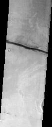 NASA's Mars Odyssey spacecraft captured this image in Sept 2003, shows that crustal fractures may have been the source for outpourings of water and lava. Conversely, the fractures may have formed after the fluvial and volcanic activity in this region.