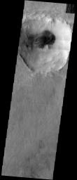 A relatively small crater (~35 km across) in the heavily cratered terrain of the southern highlands of Mars is shown in this image taken in November 2003 by NASA's Mars Odyssey spacecraft.