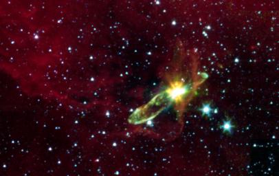 This image from NASA's Spitzer Space Telescope transforms a dark cloud into a silky translucent veil, revealing the molecular outflow from an otherwise hidden newborn star. 