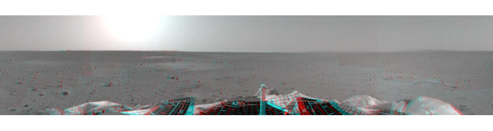 This sprawling look at the martian landscape surrounding the Mars Exploration Rover Spirit is the first 3-D stereo image from the rover's navigation camera. 'Sleepy Hollow' can be seen to center left of the image. 3D glasses are necessary.