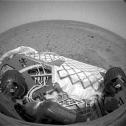 This image from the hazard avoidance camera onboard NASA's Mars Exploration Rover Spirit shows the rover in its near-final turned position on the lander at Gusev Crater. 
