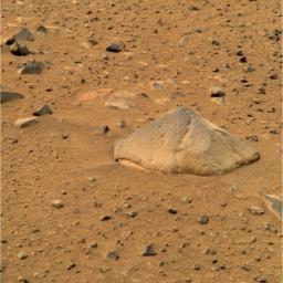 NASA's Mars Exploration Rover Spirit shows 'Adirondack,' the rover's first target rock. Spirit traversed the sandy martian terrain at Gusev Crater to arrive in front of the football-sized rock on Sunday, Jan. 18, 2004.