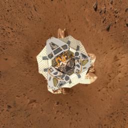 This high-resolution image shows a computer-generated model of Spirit's lander at Gusev Crater as engineers and scientists would have expected to see it from a perfect overhead view. 