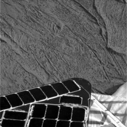NASA's Mars Exploration Rover Opportunity shows where the rover's airbag seams left impressions in the martian soil. The drag marks were made after the rover successfully landed at Meridiani Planum and its airbags were retracted.