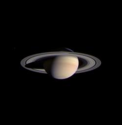 The narrow angle camera onboard NASA's Cassini spacecraft took a series of exposures of Saturn and its rings and moons on February 9, 2004, which were composited to create this stunning, color image.