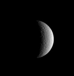The first artificial satellite in the Saturn system, NASA's Cassini spacecraft, returned images of the natural moons following a successful insertion into orbit.
