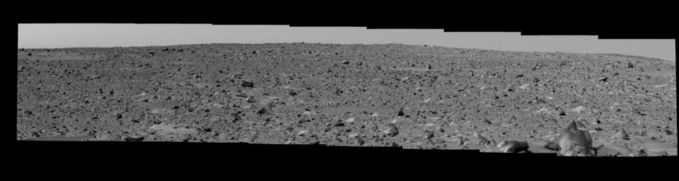 NASA's Mars Exploration Rover Spirit's view of the rocky and bumpy terrain that lies between it and the large crater dubbed 'Bonneville.' A large rock called 'Humphries' can be seen.