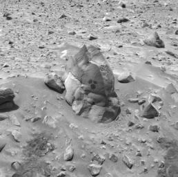 NASA's Mars Exploration Rover Opportunity shows the rock dubbed 'Humphrey' and the circular areas on the rock that were wiped off by the rover before drilling into the rock with its rock abrasion tool, exposing fresh rock underneath.